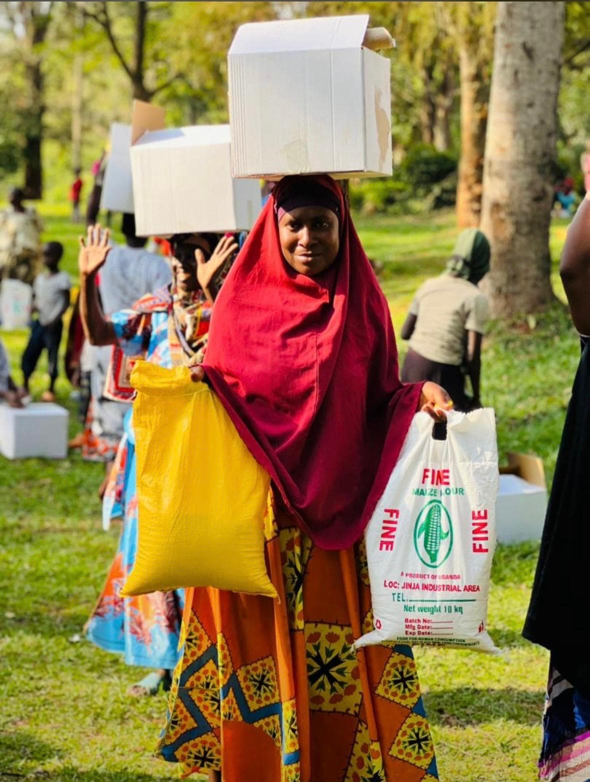 A family receiving a Musana emergency food pack